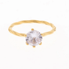 Cubic zirconia solitaire ring with twisted gold band